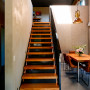 Light and dark tones create for an inviting flight of stairs