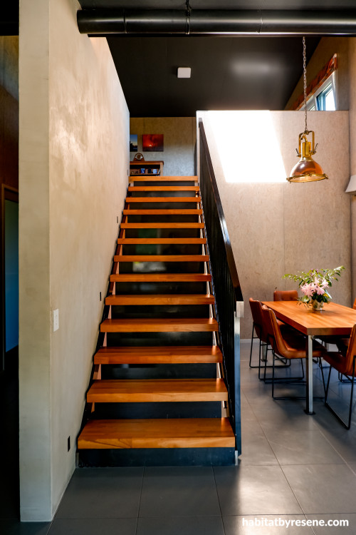 Light and dark tones create for an inviting flight of stairs