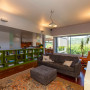 living room, lounge, renovated villa, grey living room, green bookshelf, grey paint 