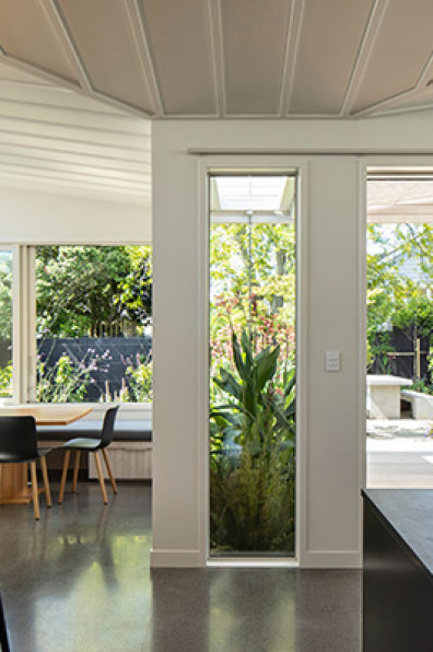 A serene villa adorned in timeless greens and whites