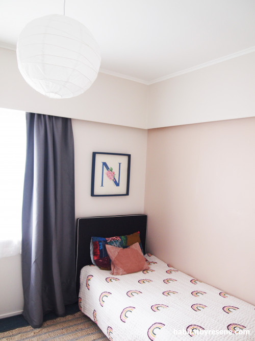 Single bedroom with white walls