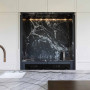 The client's desire for a moody palette was inspired by the selection of marble for the kitchen. 