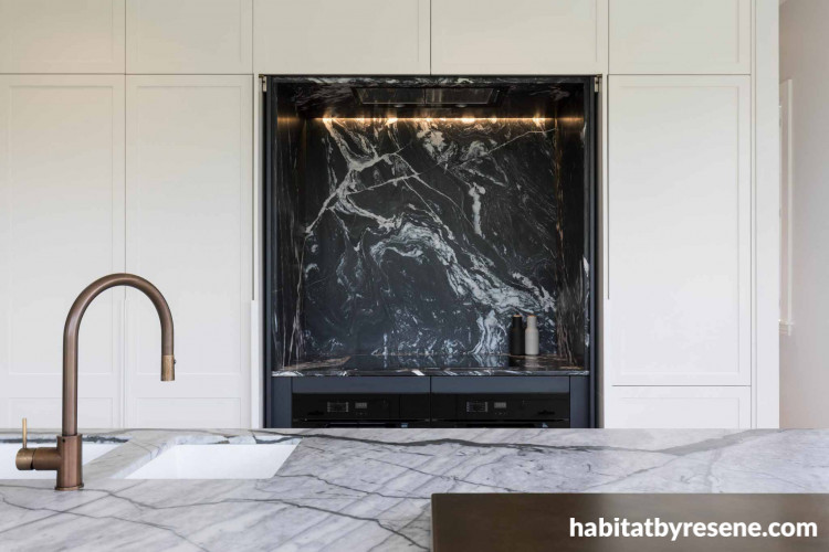 The client's desire for a moody palette was inspired by the selection of marble for the kitchen. 