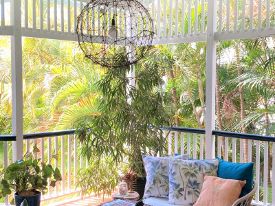This century-old Brisbane Queenslander is transformed into a tropical oasis with summer green Resene Edgewater and Resene Warrior This century-old Brisbane Queenslander is transformed into a tropical oasis with summer green Resene Edgewater and Resene Warrior