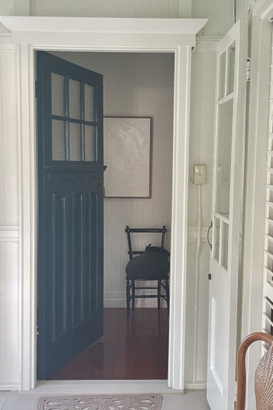 This century-old Brisbane Queenslander is transformed into a tropical oasis with summer green Resene Edgewater and Resene Warrior