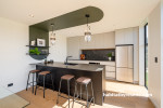 A creative use of colour works to separate the kitchen from the open plan space making it a distinct and special room on its own. 