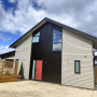 Exterior black grey red weatherboard
