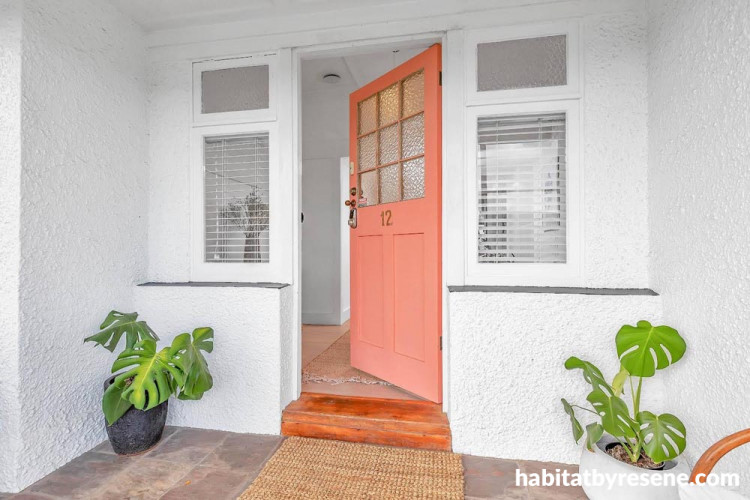 pink door, front of home, pink