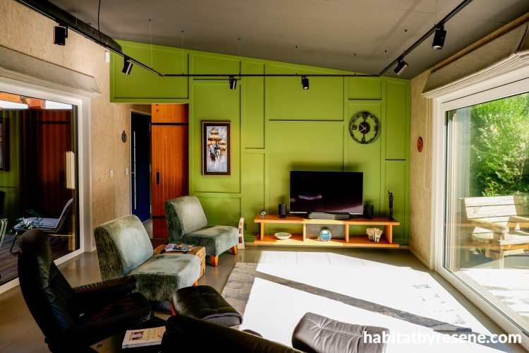 Danish style living room in a forest green