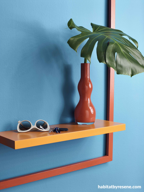Fun home entryway in eye-catching blue