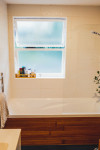 A former sailmaker’s shed becomes a colourful home to a creative family of five 