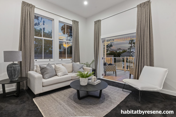 This charming living room is adorned in classic neutral décor creating a cosy, inviting feel. The walls are painted in Resene Wan White, with trims and ceiling in Resene Eighth Black White. 