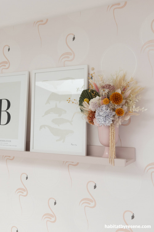 The second guest bedroom exudes a playful and whimsical feel with Resene Wallpaper Collection 36998-3.