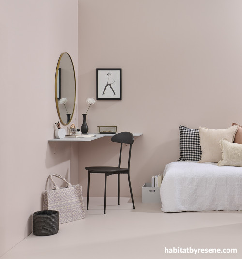 A simple cantilevered corner desk made from MDF can transform the corner of a guest bedroom into a makeup area or home workspace.