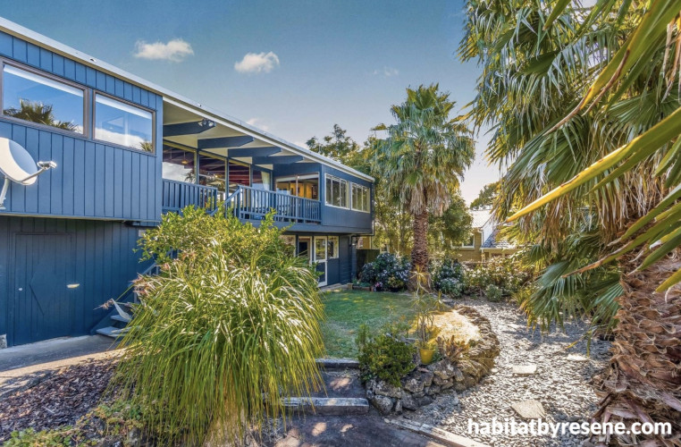 The timeless appeal of Resene Coast was used on exterior walls with trims in Resene White Pointer.