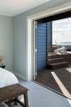 A coastal home with a creative neutral palette is renovated on time and under budget