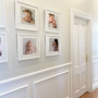 The hallway is painted in Resene Merino, with lower panelling and doors in Resene Alabaster, now showcasing pictures of her own children, just as it once did of her as a child.