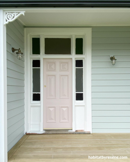 This enchanting villa is painted in Resene Half Periglacial Blue, with the front door painted in Resene Blanched Pink. Trims are painted in Resene Black White.