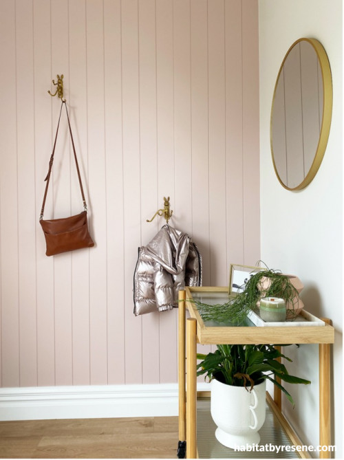 The back entrance tongue-and-groove wall is also painted in the delightful Resene Blanched Pink, creating a sense of continuity from the exterior and the front door. 