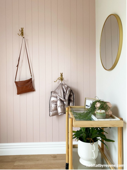 The back entrance tongue-and-groove wall is also painted in the delightful Resene Blanched Pink, creating a sense of continuity from the exterior and the front door.