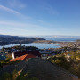 The view from the open-plan upper level with its sweeping panoramas of Lyall Bay and the Remutaka Range.