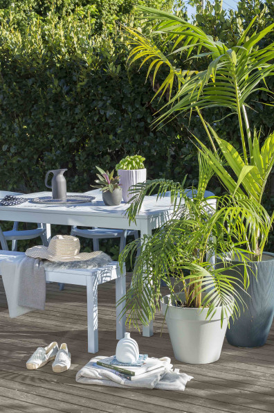 Entertain outdoors in style this holiday season with these tips for decorating courtyards, gardens and patios