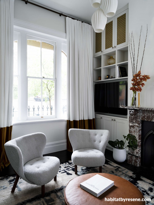 This exquisite sitting room is a unique and charming space.  