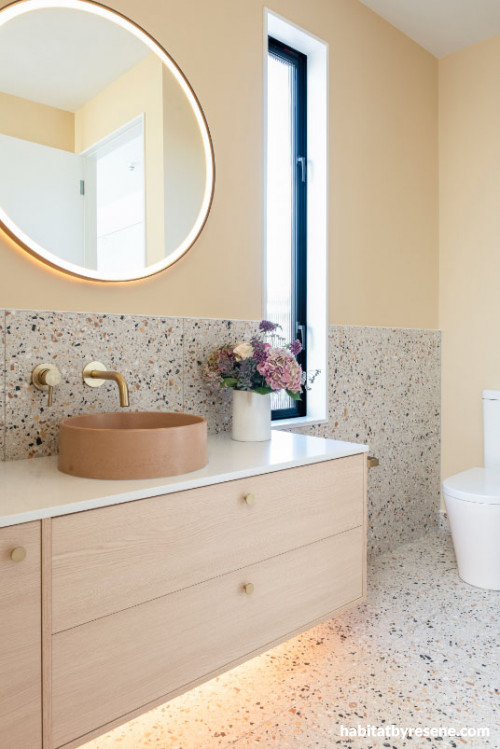 Golden cream tone creates mellow and relaxing bathroom space