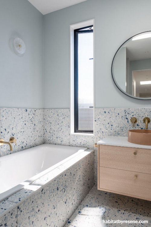 Cool toned blue adorns bathroom 