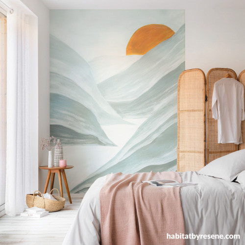 Wallpaper with light green tones brightens bedroom space