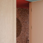 Bathroom and living area painted in Resene Juniper and Resene Red Oxide