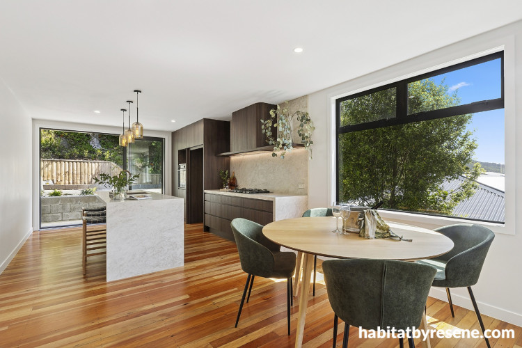 Dining area and kitchen painted in Resene White Pointer