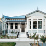 House exterior featuring weatherboards painted in Resene Gull Grey and trims in Sea Fog