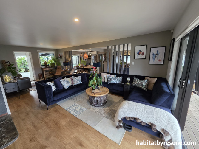 Open plan living area and dining area featuring walls in Resene Half Pravda, ceiling in White
