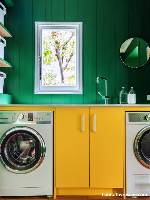 Laundry featuring cabinetry in Resene Bright Spark and walls in Crusoe