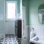 Bathroom featuring walls in Resene Gum Leaf