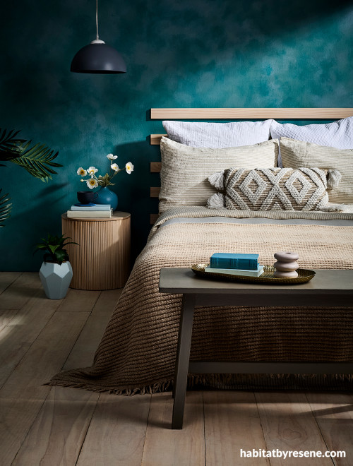 Teal bedroom featuring wall painted in Resene Undercover with Resene FX Paint Effects Medium mixed with Deep Teal and Nepal