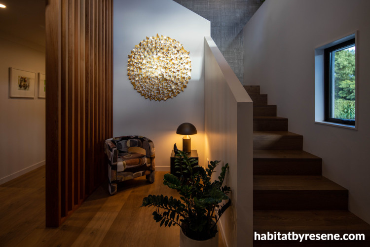 Entranceway, stairwell featuring timber floors and wood panelling