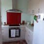 Kitchen, kitchen featuring light peppermint green and dark red