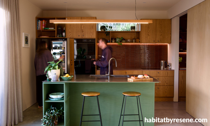 Kitchen island in Resene Tom Thumb and walls in Cashmere