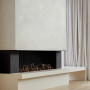 Modern fireplace featuring custom beige plaster painted in Resene Quarter Bison Hide