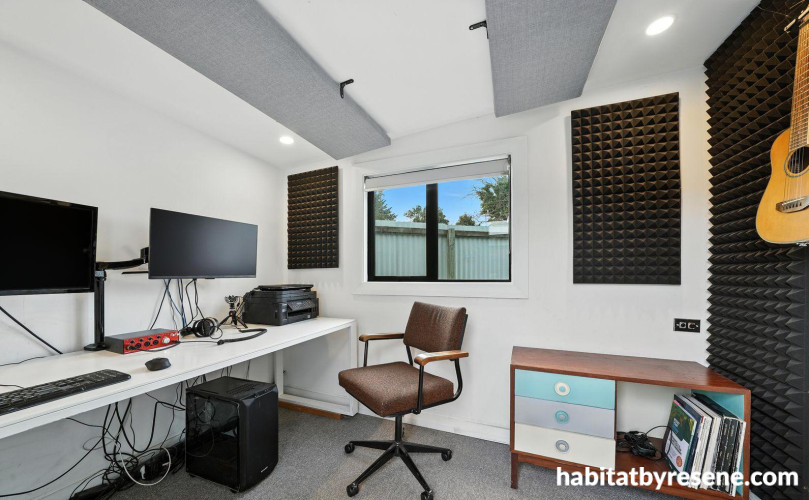 Home studio with walls painted in white