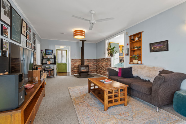 Living room featuring crisp blue walls.