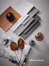 Grey moodboard with burnt orange accent colours