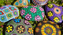 Painting happiness one rock at a time photo