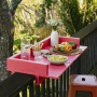 This fun and practical fence bar is painted in the bright Resene Rapture.