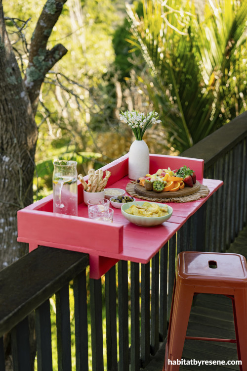 This fun and practical fence bar is painted in the bright Resene Rapture.