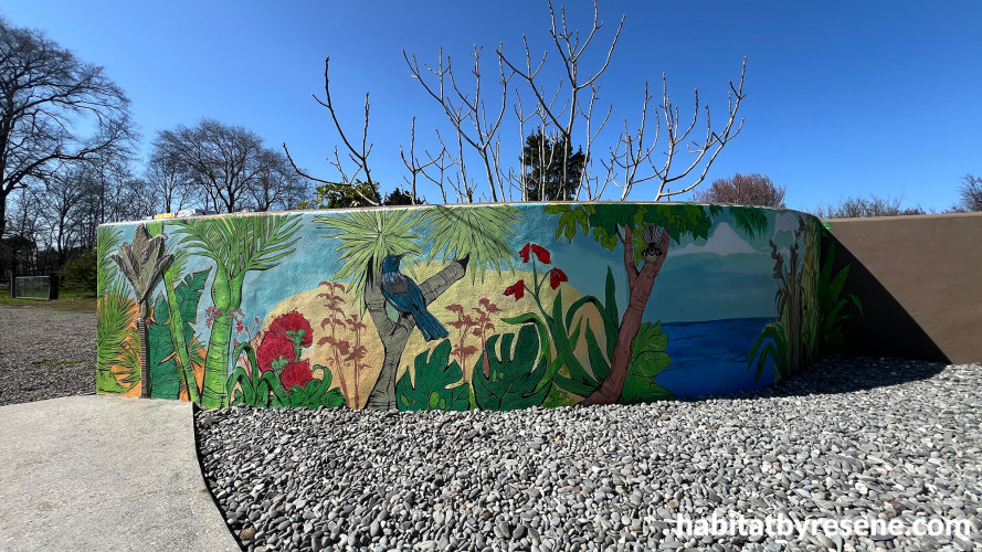 Outdoor mural featuring native birds and nature