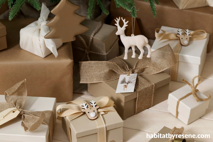 Christmas present boxes painted in neutral tones