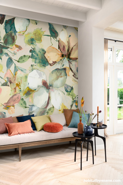 Living room featuring floral wallpaper